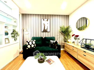 Stylish living room with modern decor and green velvet sofa