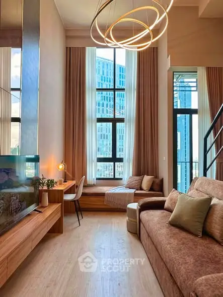 Luxurious modern living room with high ceilings and elegant decor in a stylish apartment.