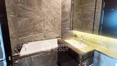 Luxurious modern bathroom with elegant marble tiles and sleek fixtures