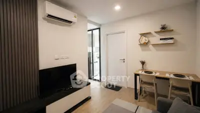 Modern living room with air conditioning and stylish decor in a cozy apartment.