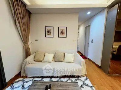 Cozy living room with stylish decor and comfortable seating in modern apartment.