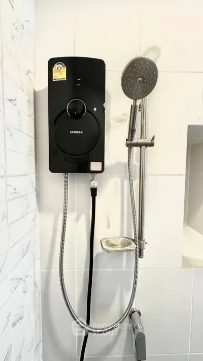 Modern bathroom with sleek shower system and elegant tile design