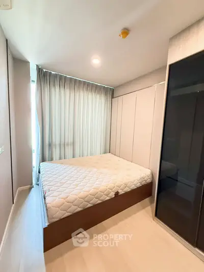 Modern bedroom with sleek design and natural light