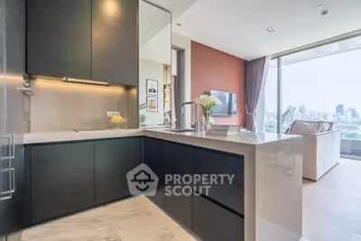 Luxurious modern kitchen with open layout and stunning city view