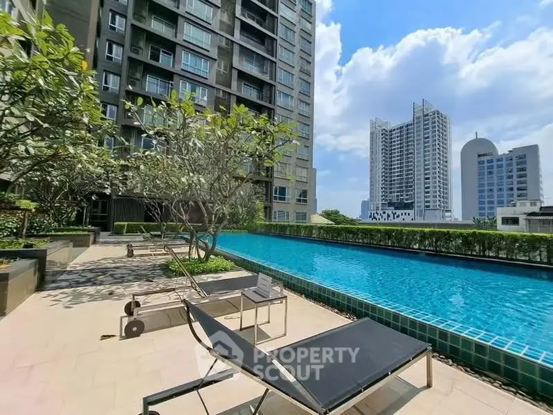 Luxurious urban apartment with rooftop pool and stunning city views.