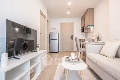 Modern living room with sleek furniture and open kitchen layout