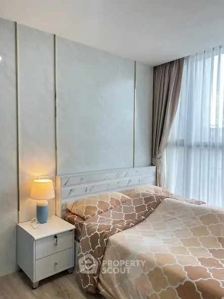 Cozy bedroom with modern decor and natural light