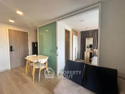 Modern apartment interior with open living area and cozy bedroom