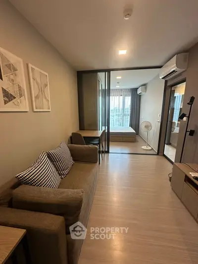 Modern apartment interior with cozy living room and stylish bedroom