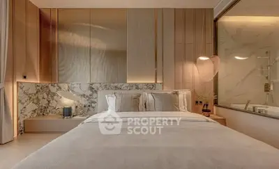 Luxurious modern bedroom with elegant marble accents and ambient lighting