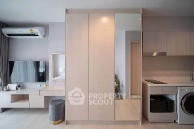 Modern apartment interior with sleek kitchen and stylish living area