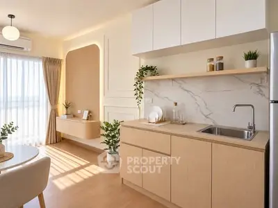 Modern kitchen with open layout and natural light, featuring sleek cabinetry and elegant decor.