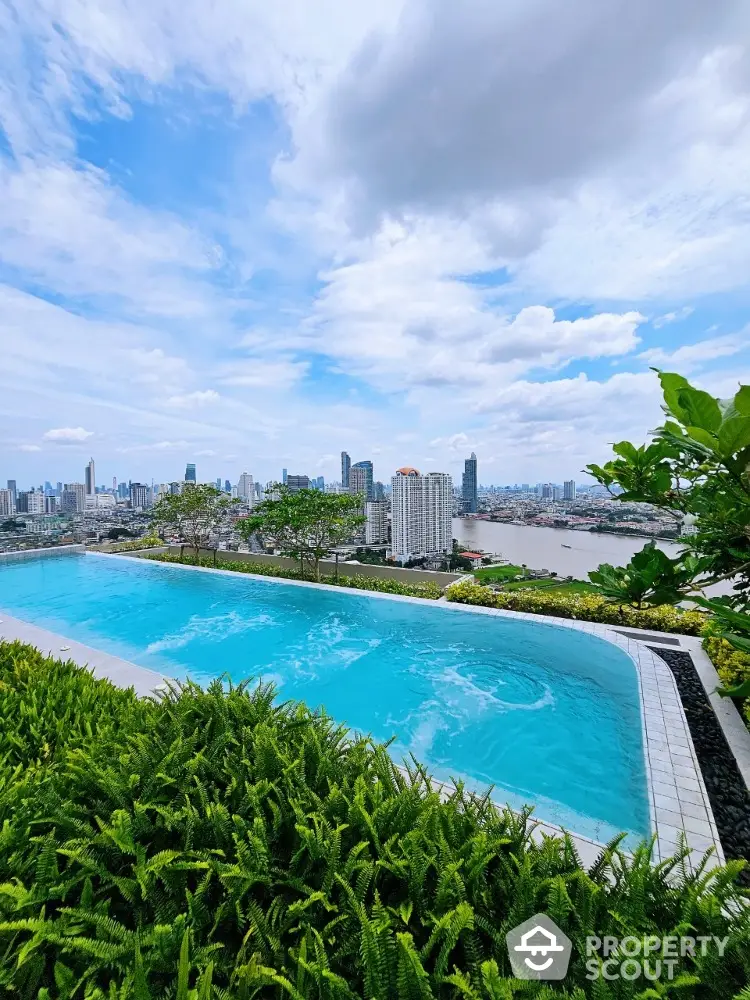 Stunning rooftop pool with panoramic city and river view