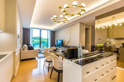 Luxurious open-plan living room and dining area with elegant lighting and scenic view.