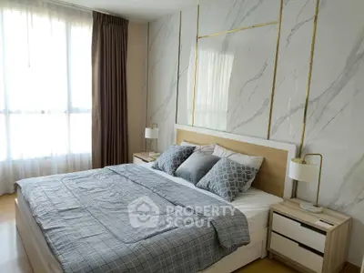 Luxurious bedroom with elegant decor and natural light