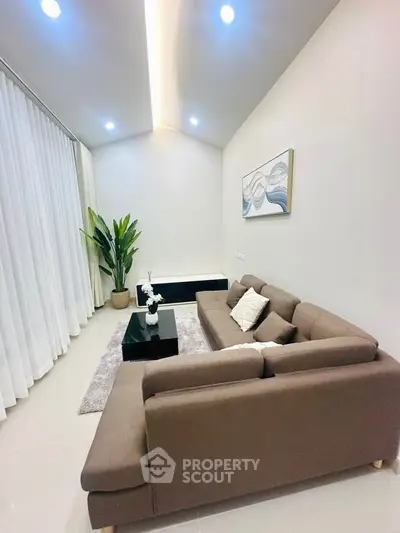 Modern living room with stylish sofa and elegant decor