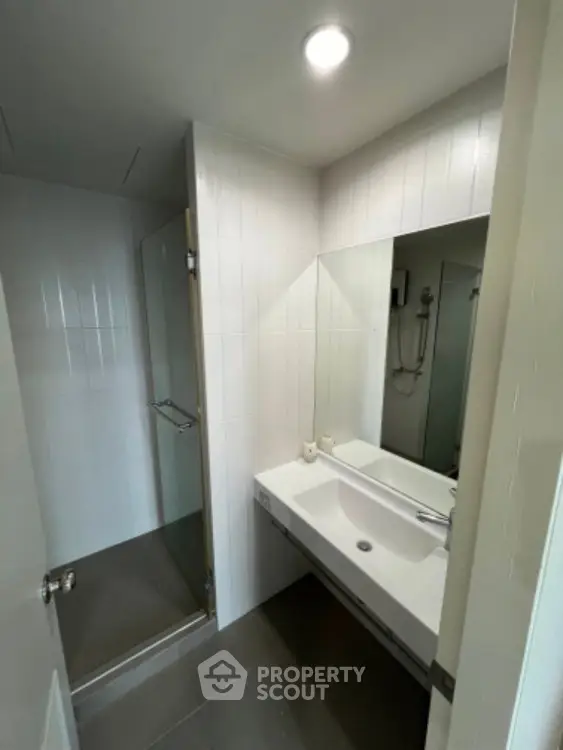 Modern bathroom with sleek design and spacious shower area