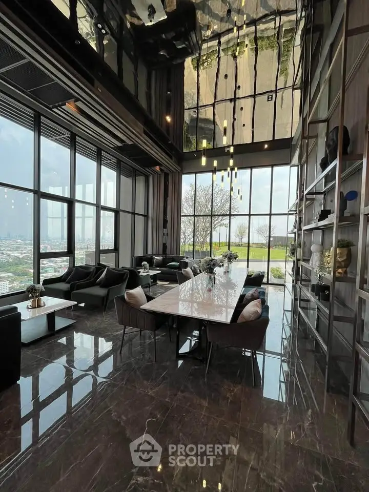 Luxurious high-rise living room with floor-to-ceiling windows and stunning city view.