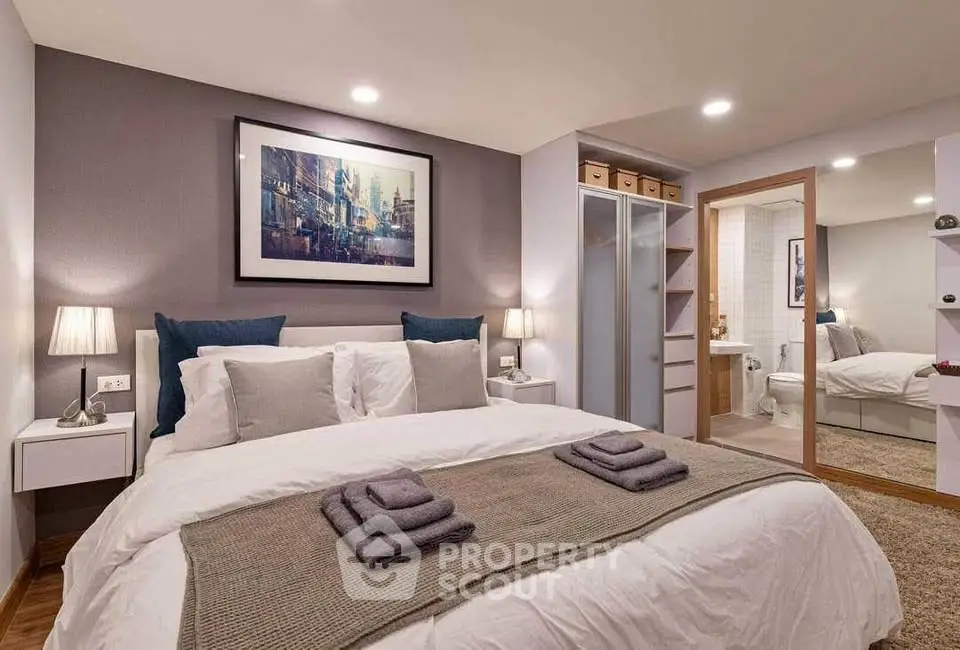 Cozy modern bedroom with ensuite bathroom and stylish decor