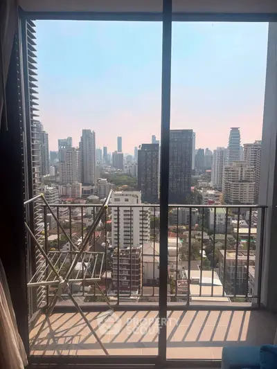 Stunning cityscape view from high-rise balcony with modern skyline