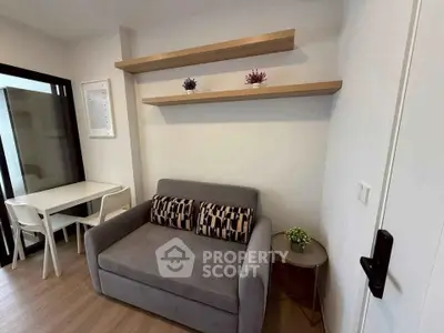 Cozy living room with modern sofa and stylish shelves in a contemporary apartment.