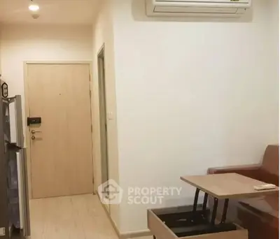 Cozy apartment entrance with modern furniture and air conditioning