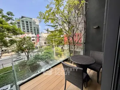 Chic urban balcony with modern furniture and lush greenery, offering a serene city view.