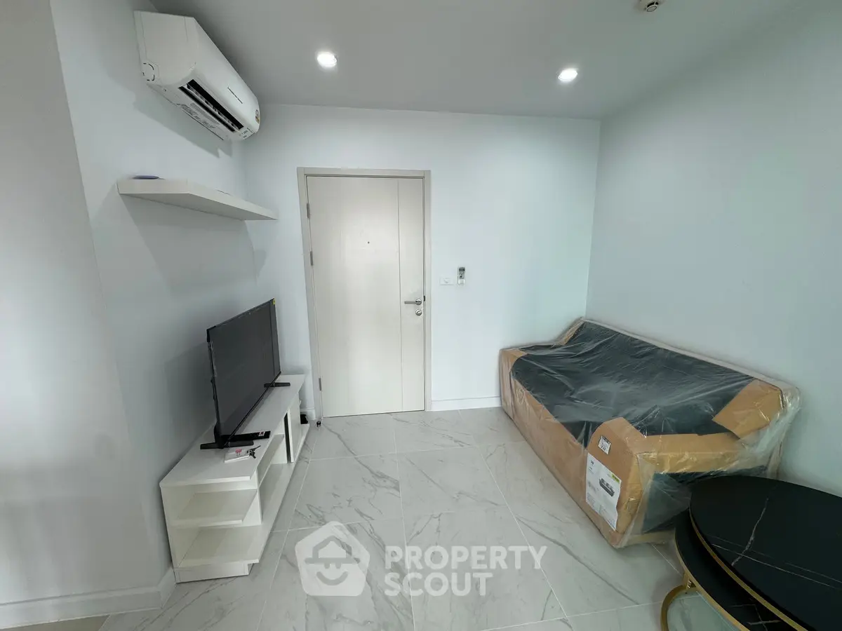 Modern living room with air conditioning and sleek furniture