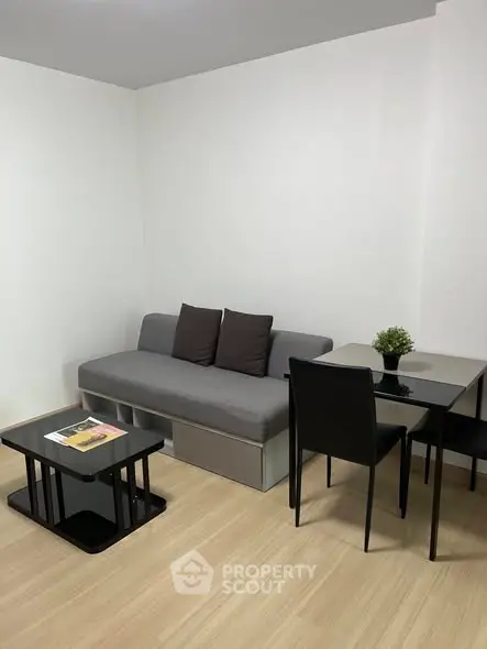 Modern living room with sleek furniture and minimalist decor