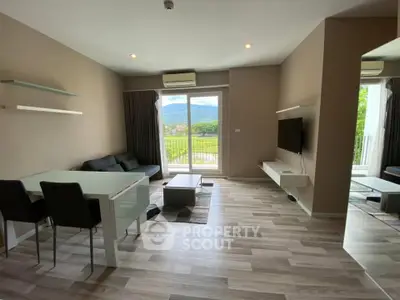 Modern living room with mountain view and sleek furniture
