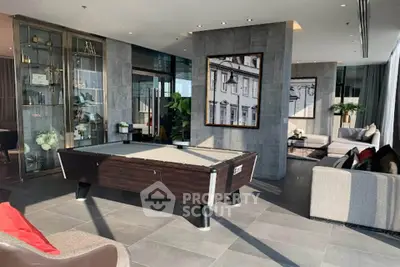 Luxurious modern living room with pool table and elegant decor