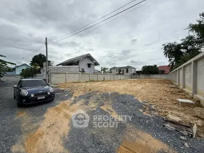 Spacious residential plot with potential for development in a suburban neighborhood.