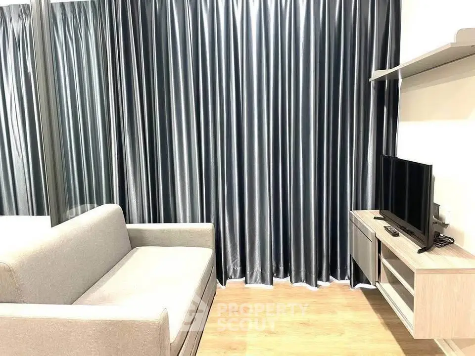 Modern living room with sleek curtains and minimalist furniture design