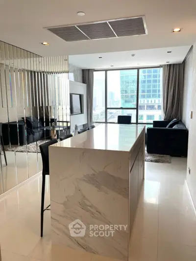 Luxurious modern living room with marble island and city view, perfect for urban living.