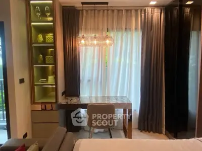Modern bedroom with elegant desk and stylish lighting, featuring a cozy ambiance and chic decor.