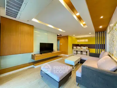 Spacious modern living room with stylish furniture and elegant lighting