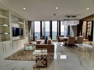 Luxurious modern living room with elegant dining area and city view.