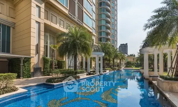 Luxurious condominium with stunning pool and lush landscaping
