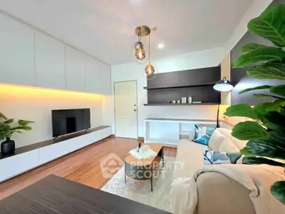 Modern living room with stylish decor and ambient lighting
