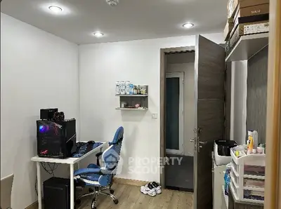Modern study room with gaming setup and sleek decor