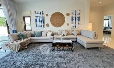Luxurious living room with elegant sectional sofa and stylish decor in a modern home.
