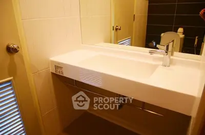 Modern bathroom with sleek sink and stylish fixtures