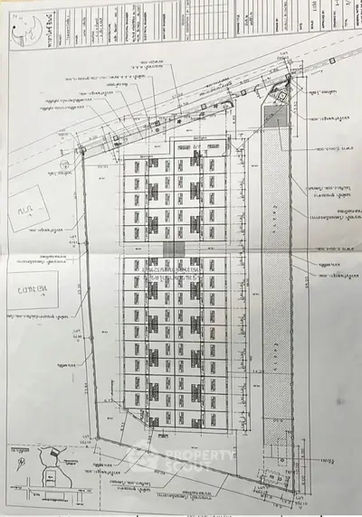 Detailed architectural blueprint of a residential building layout with precise measurements and annotations.