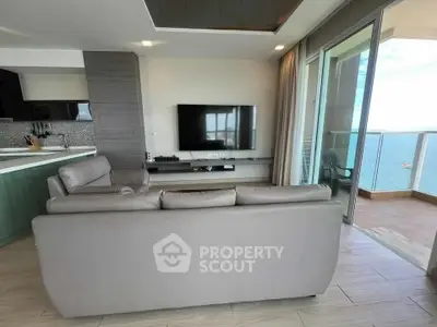 Modern living room with ocean view and sleek interior design