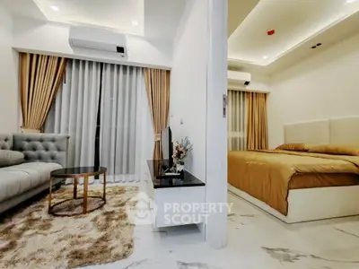 Modern apartment interior with cozy living room and elegant bedroom