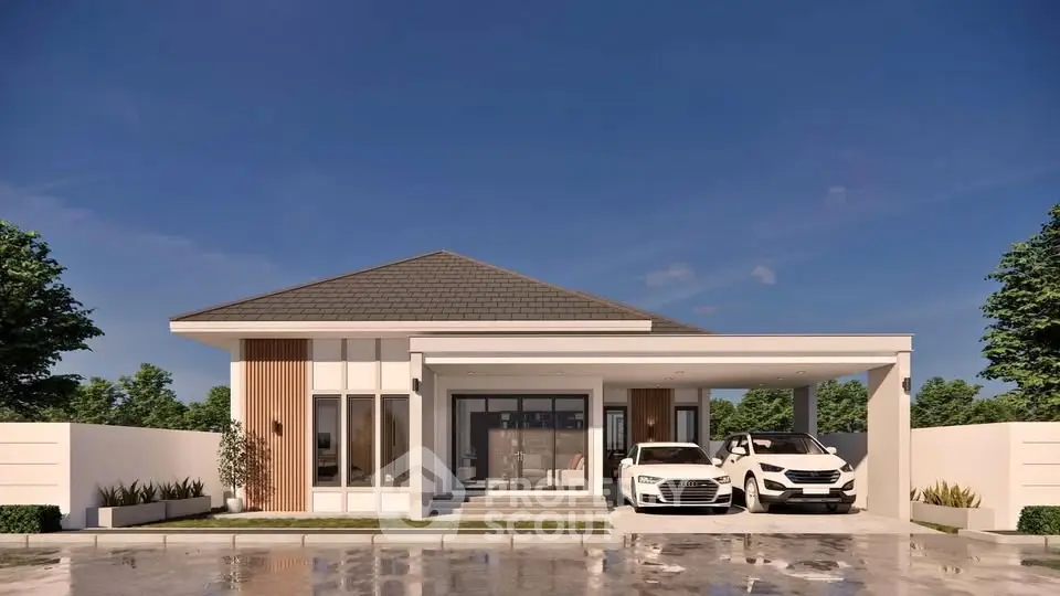 Modern single-story house with two-car garage and sleek design.
