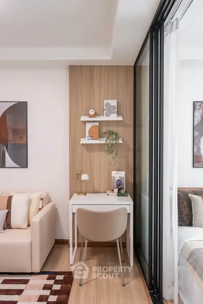 Modern living room with stylish decor and cozy workspace
