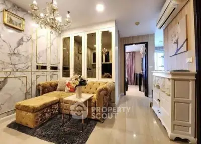 Luxurious living room with elegant decor and plush seating in a modern apartment.