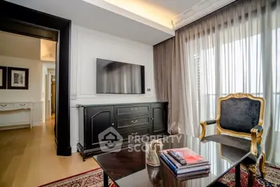 Luxurious living room with elegant furniture and large window, perfect for sophisticated urban living.