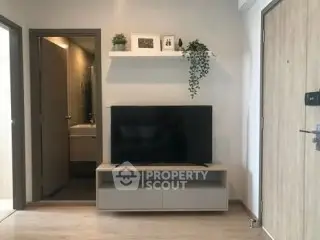 Modern living room with sleek TV setup and minimalist decor